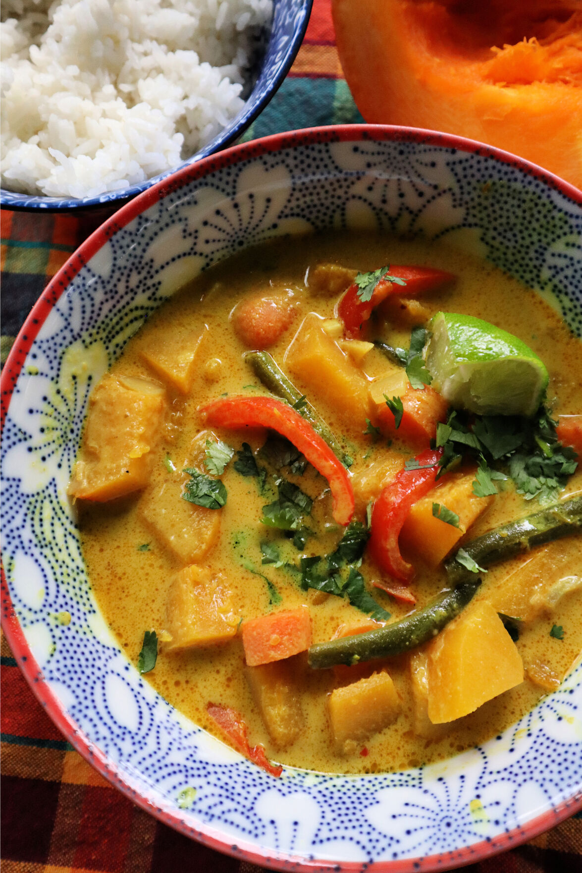 Thai pumpkin curry is made with cubed 'Touch of Autumn' pumpkin, coconut milk and red curry paste. Green beans and bell pepper add crunch.